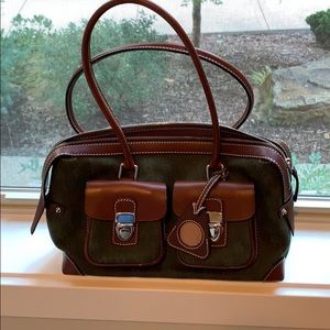 Dooney Bourke Purse green with brown accents.
